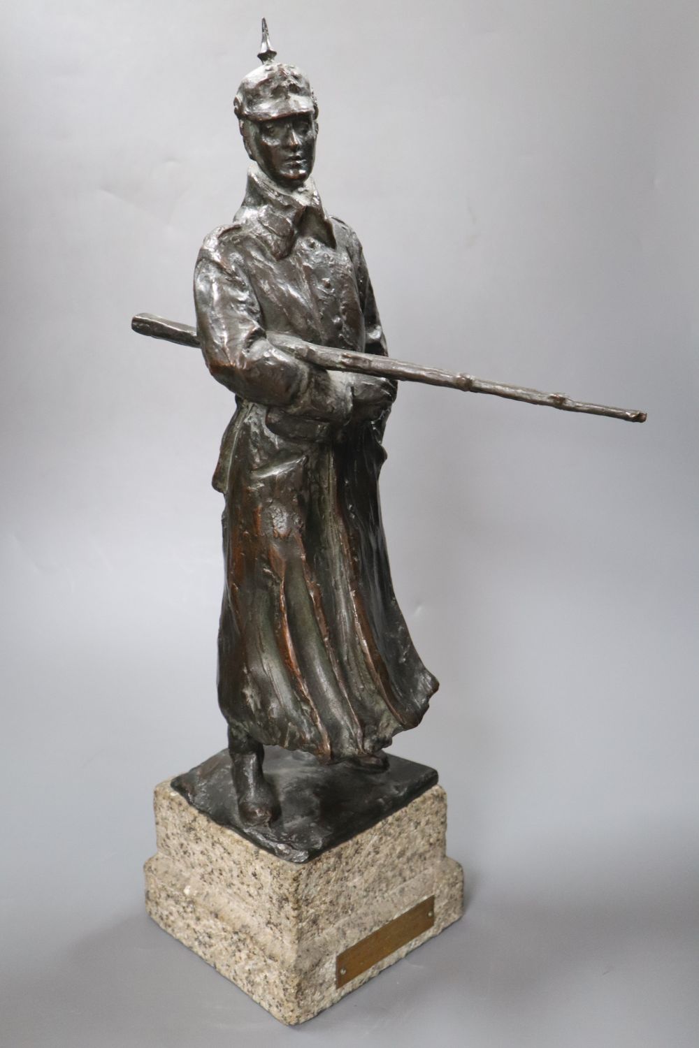 A bronze of Herrn Oberst von Suckow, signed, with related papers, height 51cm overall